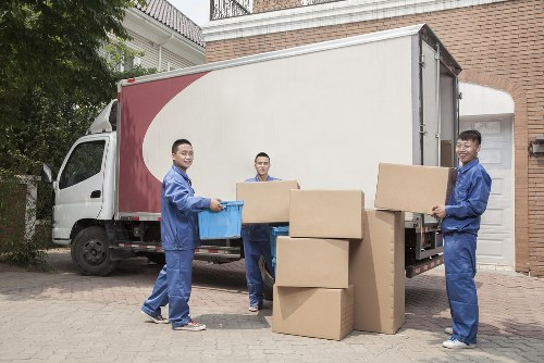 Man with van loading items for a Sutton move