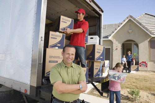 Moving truck servicing Sutton flats, houses, and offices
