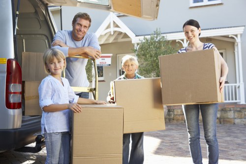 Removal team planning a home move in Sutton street with residential parking
