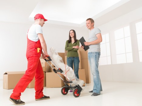 Professional movers handling a flat move in Sutton