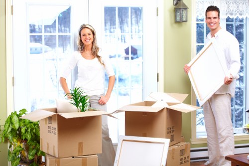 Preparation checklist and packed boxes ready for a home move in Sutton